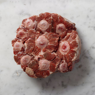 Raw oxtail on a marble surface