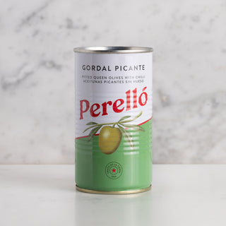 Perello Olive tin on white marble